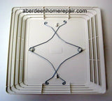 Replacement grille with spring mount Broan S97013576